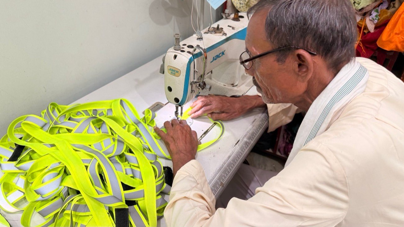Eco Reflect collars being stitched locally in Jaipur