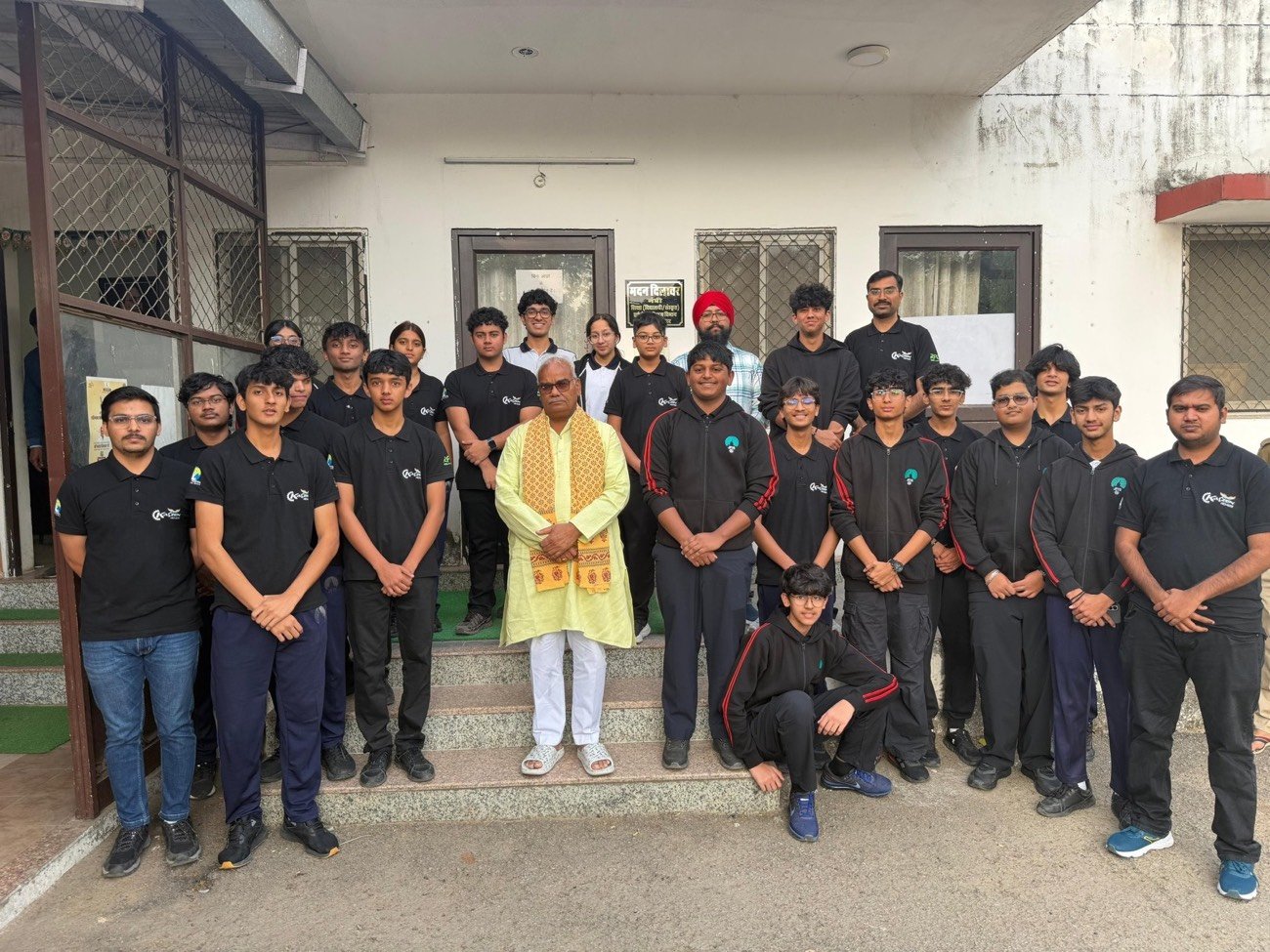 The school FIRST Robotics Competition team with the Minister for School Education